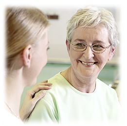 young woman talking to an elderly lady